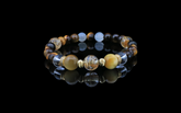 Golden Radiance Bracelet - A Harmony of Tiger's Eye, Yellow Tiger's Eye, Rutilated Quartz, Moonstone, and Clear Quartz