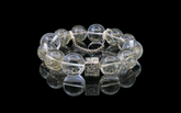 Emerald Radiance Bracelet - A Fusion of Green Rutilated Quartz, Clear Quartz, and Sterling Silver