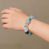 Clarity & Communication Crystal Bracelet - Amazonite, Snowflake Quartz, Clear Quartz, Silver Obsidian & Aquamarine