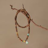 Sacred Agarwood & Agate Lotus Bracelet - A Convergence of Nature and Spirituality