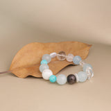 Clarity & Communication Crystal Bracelet - Amazonite, Snowflake Quartz, Clear Quartz, Silver Obsidian & Aquamarine